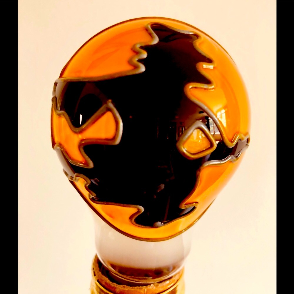 Vintage EXC flying witch on a broomstick painted relief light bulb Orange& black